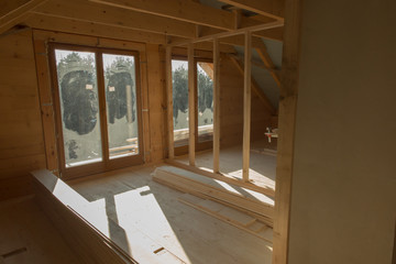 building a house with wooden beams