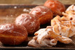 Donuts and faworki. Traditional Polish cookies on Fat Thursday