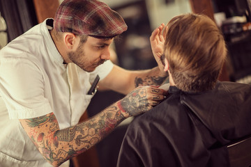 barber shaving beard.