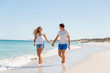 © Sergey Nivens - Romantic young couple on the beach