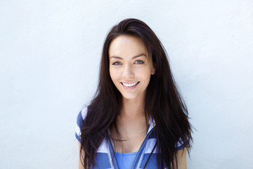 Wall Mural - Portrait of an attractive young woman smiling