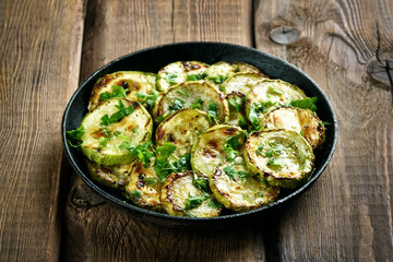 Wall Mural - Fried zucchini with herbs