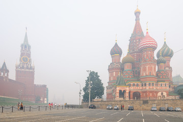 MOSCOW, RUSSIA - AUGUST 08, 2010: View of Kremlin and St. Basil Cathedral during the smog in Moscow