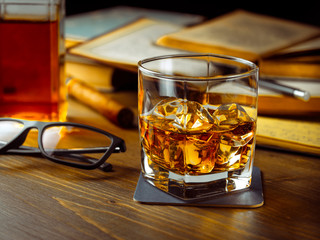 Poster - Whiskey on the rocks and scholar books