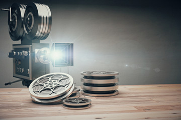 Wall Mural - Vintage old movie camera and film cartridge on a wooden table