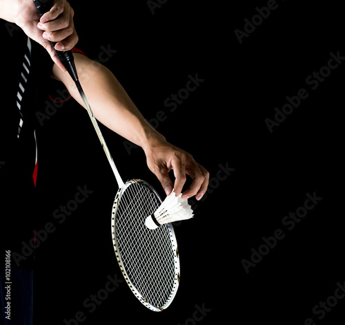 Fototapety Badminton  badmintonista-trzymajacy-rakiete-i-lotke