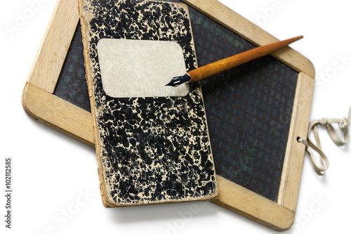 Fényképezés An old slate, a penholder and exercise book