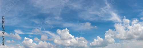 Fototapeta na wymiar Vibrant color panoramic sky with cloud on a sunny day.