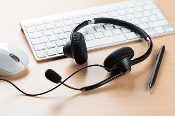 Office desk with headset. Call center