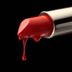 red melting lipstick isolated on black background