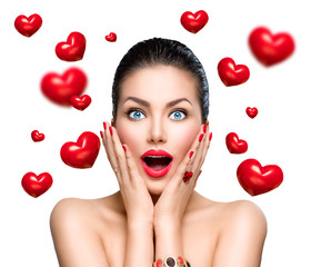 Wall Mural - beauty fashion surprised woman with flying red hearts