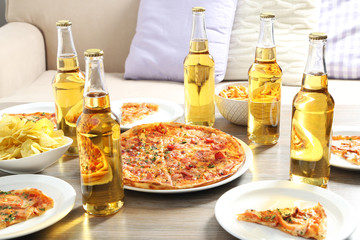 Wall Mural - Table at home with pizza and drinks for friends