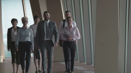 Sticker - business team, businesspeople  group walking at modern bright office interior