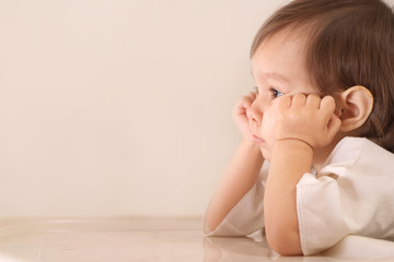 Wall Mural - portrait of thoughtful little girl