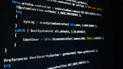 Wall Mural - software developer programming code. abstract computer script code. shallow depth of field, selectiv