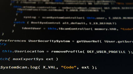Wall Mural - software developer programming code. abstract computer script code. shallow depth of field, selectiv