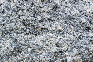 Rough gray and black grain granite as background