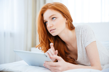 Poster - Redhead woman thinking about something