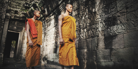 Wall Mural - Contemplating Monk in Cambodia Culture Concept