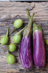 Canvas Print - Mix of tomato with purple eggplants