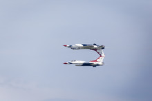 USAF Thunderbirds Aerobatics Team Doing The Calypso Pass 