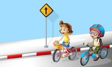Boy And Girl Riding Bike On The Street
