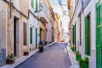 Fototapete - View of an narrow street with mediterranean buildings