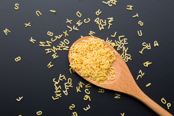 alphabet pasta in spoon