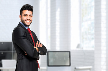 Confident businessman in his studio