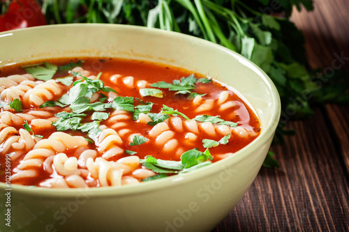 Fototapeta na wymiar Tomato soup noodles in the bowl