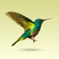 Hummingbird made with triangles. Vector polygonal illustration