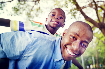 African Son Dad Piggy Back Family Outdoors Concept