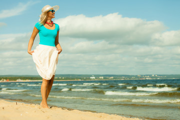 Canvas Print - Beautiful blonde girl on beach, summertime