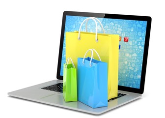 Wall Mural - laptop and  shopping pags on white background