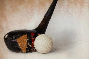 Wall Mural - Vintage, antique golf driver (putter). golf club. retro paper background.