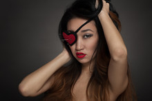 Woman With Heart Shape Eye Patch