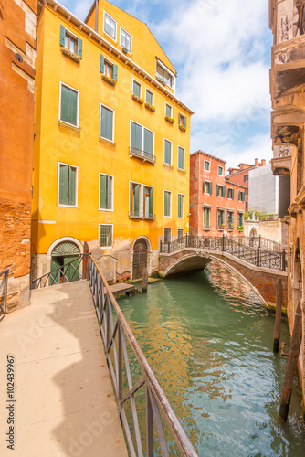 Fototapeta na wymiar Lovely view on the bridge and the canal of Venice.