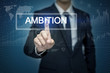 © tonefotografia - Businessman hand touching AMBITION button on virtual screen