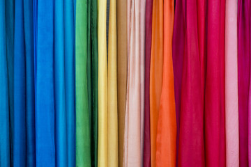 Background of rainbow color textile close up
