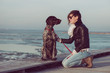 © Laszlo - Young woman train her German pointer dog outdoor