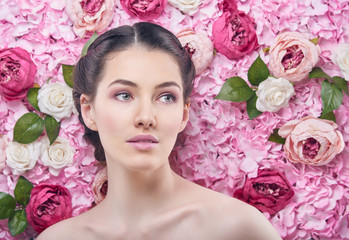 woman on a background of flowers