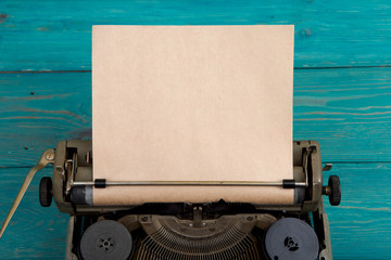 Fototapete - typewriter on the blue wooden desk