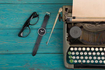 Fototapete - typewriter on the blue wooden desk