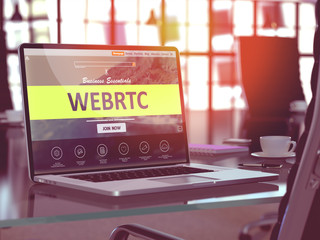 Poster - webrtc - web real time communication - concept. closeup landing page on laptop screen on background 