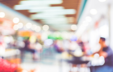 Poster - Blurred background : people eating at food court with bokeh ligh