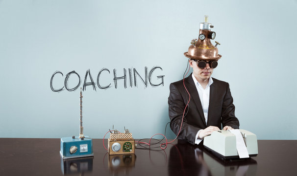 Coaching concept with vintage businessman and calculator