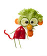 Funny monkey made of fresh vegetables on white background