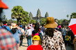 Crowds of people at Angkor Wat, foreground out of focus with Angkor Wat in focus