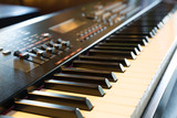 Electronic musical keyboard synthesizer