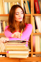 Wall Mural - Girl student in college library